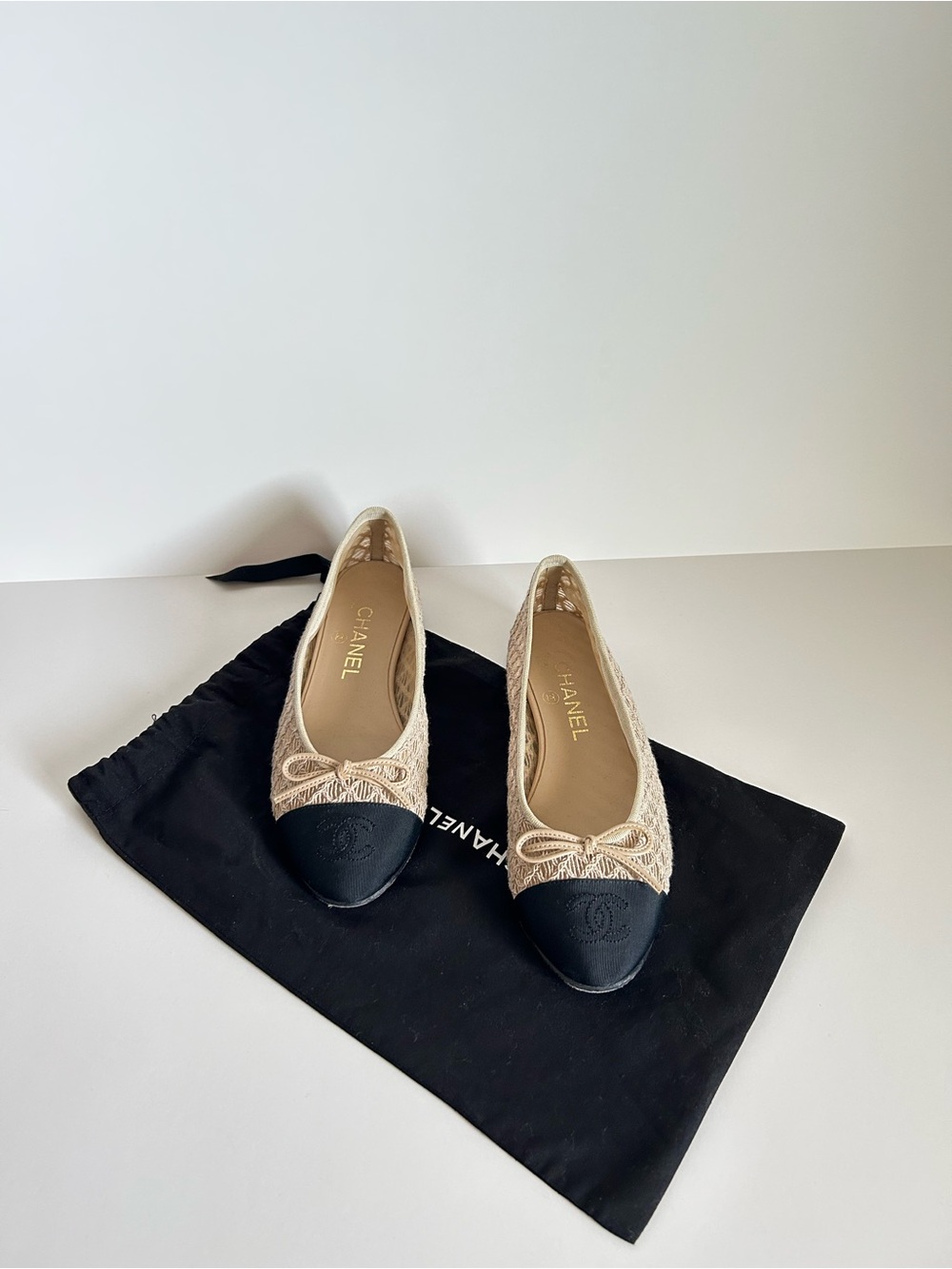 CHANEL Beige Lace Ballet Flats with Black Cap Toe